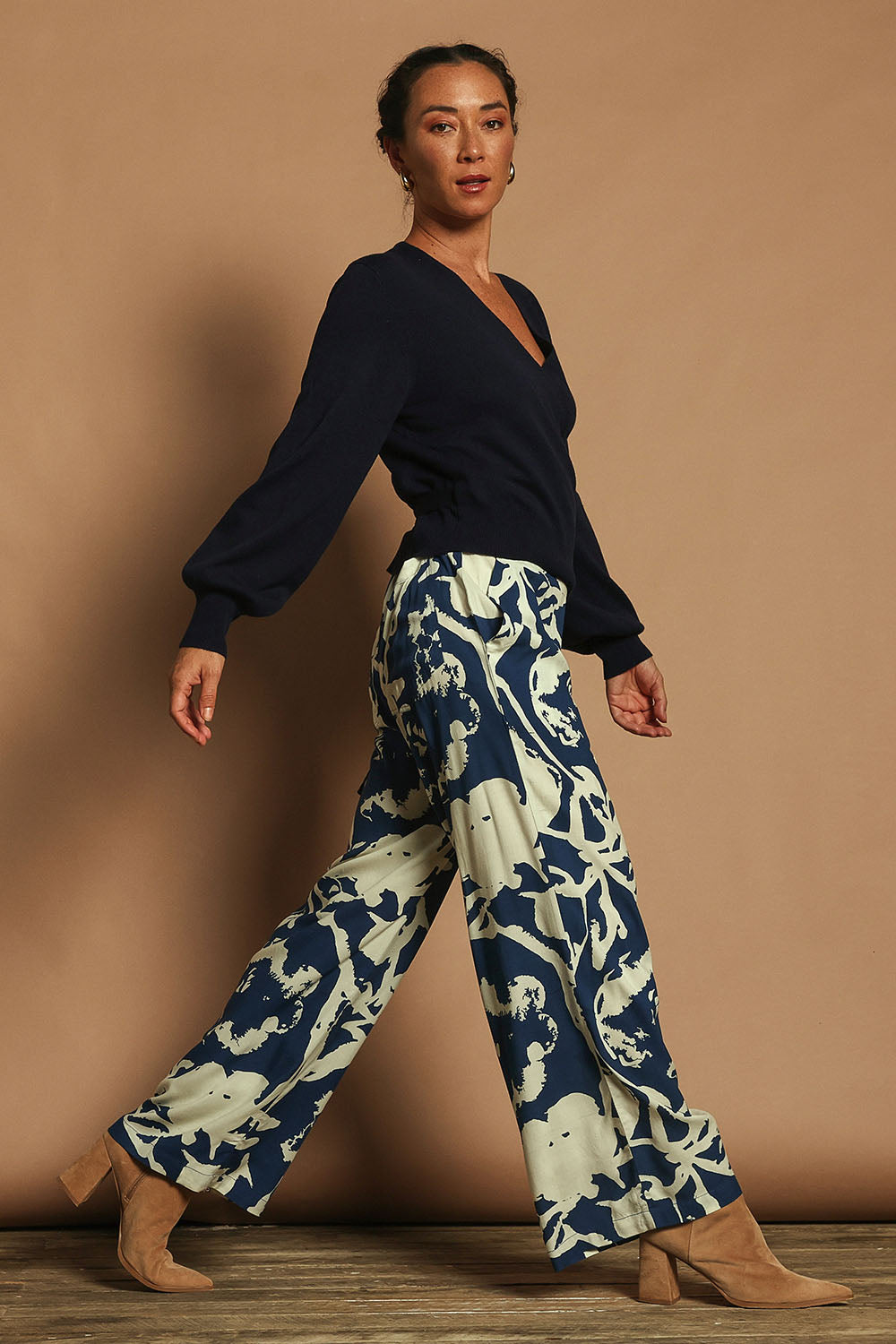 Model Katie wearing size 10 of the Kayla Pant in colour Inkblot (Blue), from the front, showing the whole outfit