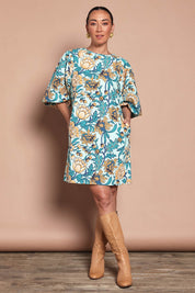 Model Katie wearing size 10 of the Josephine Cotton Dress in colour Thistle, from the front, showing the whole outfit