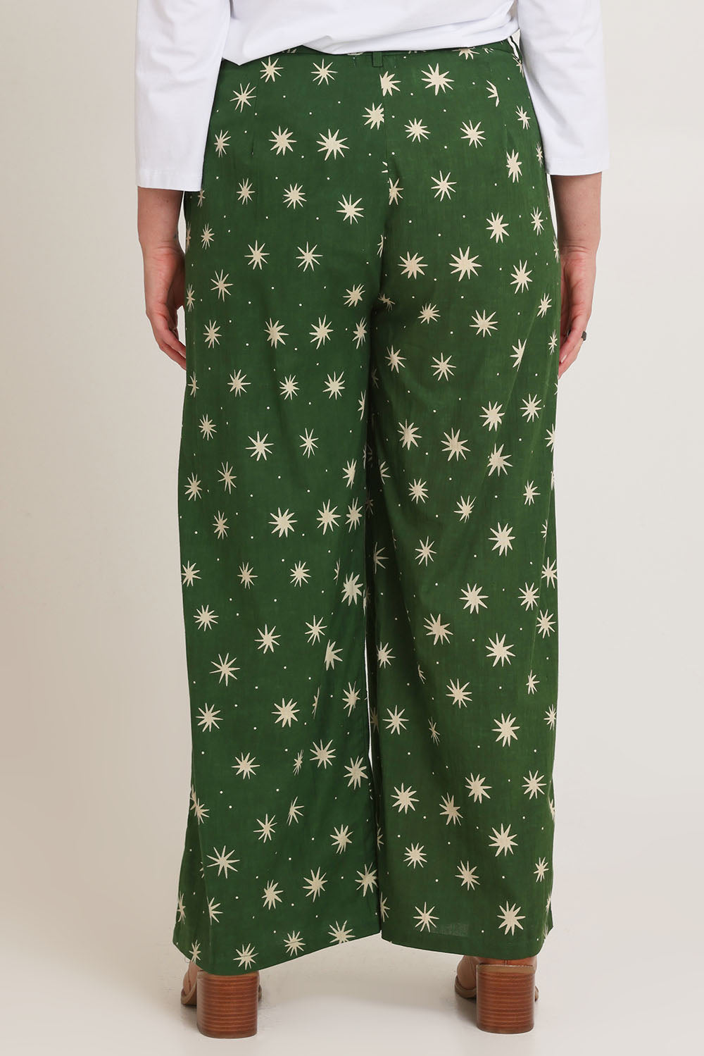 Model Chanel wearing size 16 of the Patricia Cotton Pant in colour Nightsky (Green), from the back