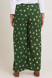 Model Chanel wearing size 16 of the Patricia Cotton Pant in colour Nightsky (Green), from the back