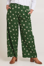 Model Chanel wearing size 16 of the Patricia Cotton Pant in colour Nightsky (Green), from the front, cropped image