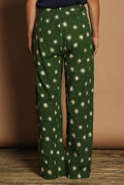 Model Katie wearing size 10 of the Patricia Cotton Pant in colour Nightsky (Green), from the back