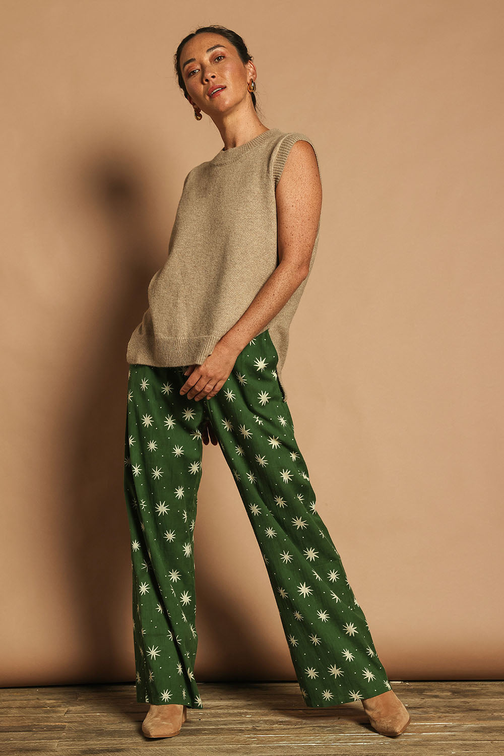 Model Katie wearing size 10 of the Patricia Cotton Pant in colour Nightsky (Green), from the front, showing the whole outfit
