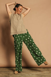 Model Katie wearing size 10 of the Patricia Cotton Pant in colour Nightsky (Green), from the front, showing the whole outfit