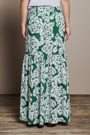 Model Katie wearing size 10 of the Ella Tiered Skirt in colour Blooming (Green), from the back