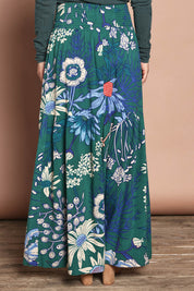 Model Katie wearing size 10 of the Ella Tiered Skirt in colour Deepgreen (Green), from the back