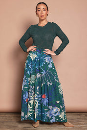 Model Katie wearing size 10 of the Ella Tiered Skirt in colour Deepgreen (Green), from the front, showing the whole outfit