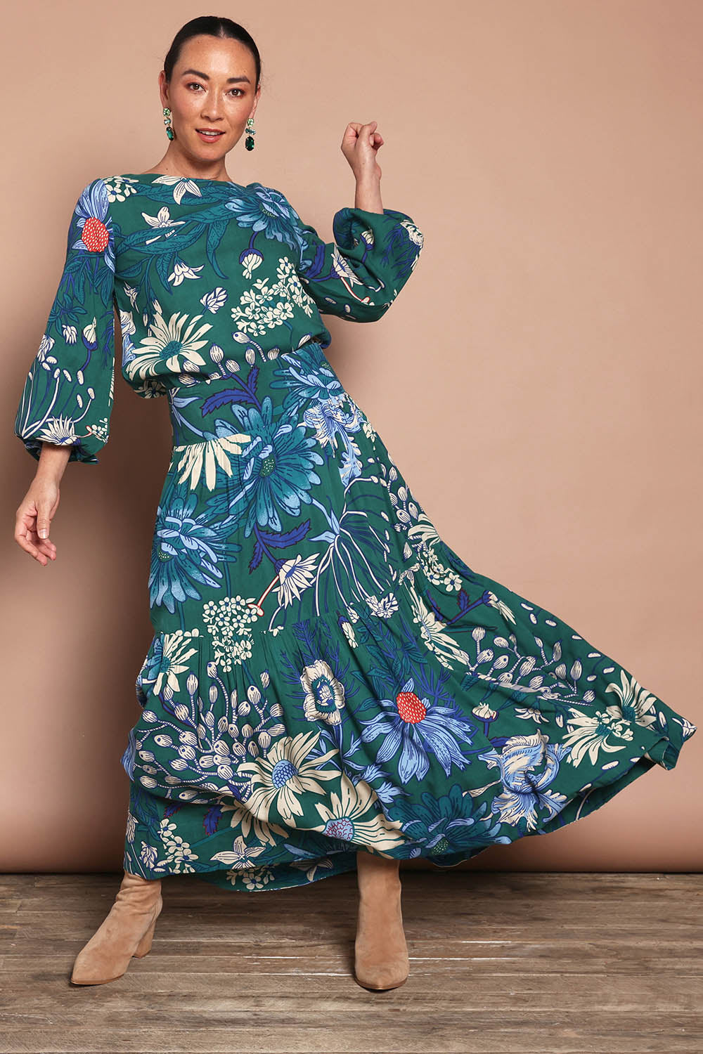Model Katie wearing size 10 of the Ella Tiered Skirt in colour Deepgreen (Green), from the front, showing the whole outfit