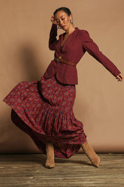 Model Katie wearing size 10 of the Ella Tiered Skirt in colour Geometric, from the front, showing the whole outfit