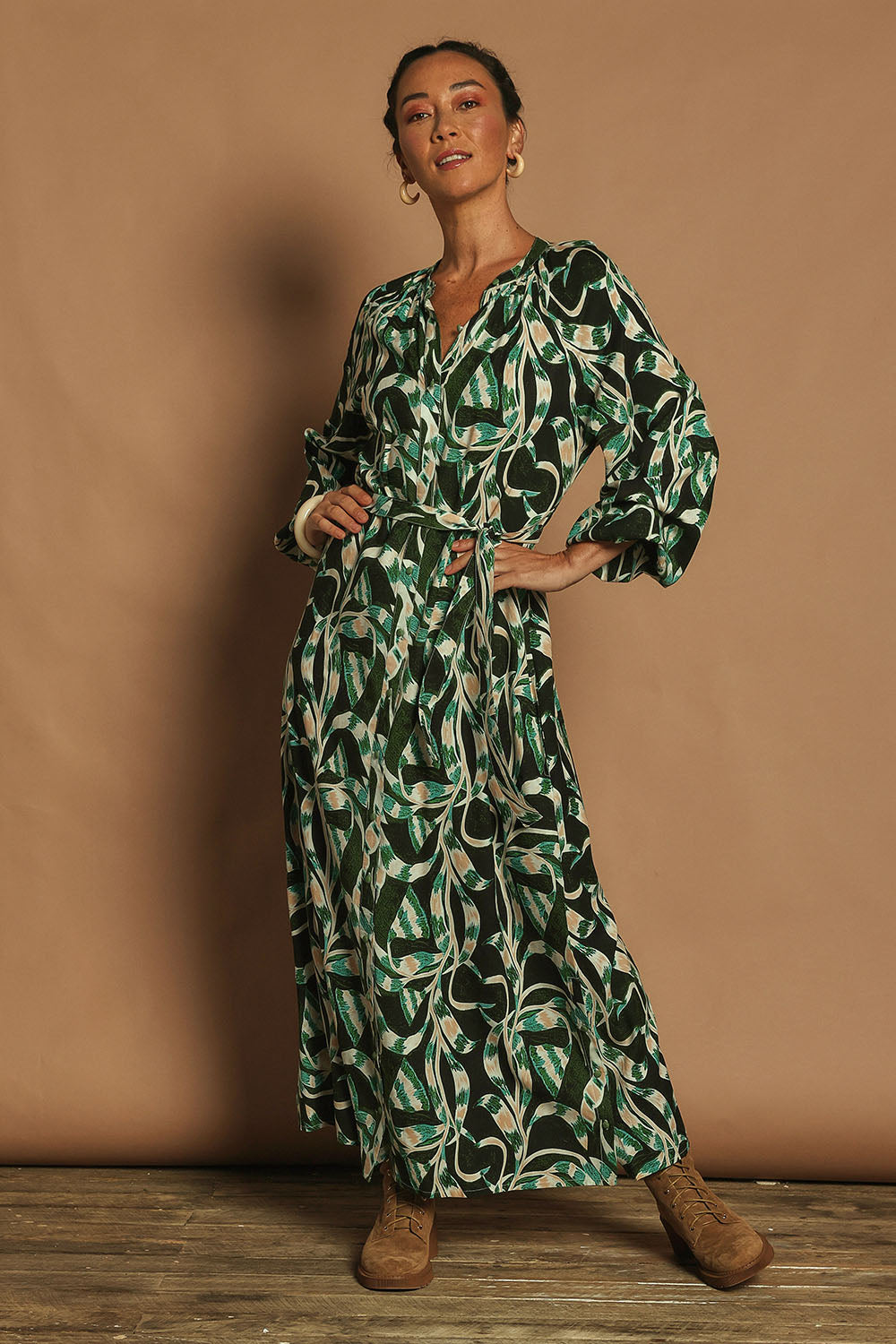 Model Katie wearing size 10 of the Taylor Button Up Dress in colour Twistvine (Green), from the front, showing the whole outfit
