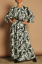 Model Katie wearing size 10 of the Ruth Cotton Maxi Dress in colour Windfleur (Black), from the front, cropped image