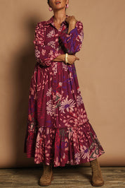 Model Katie wearing size 10 of the Nicole Cotton Maxi Dress in colour Garden (Purple), from the front, cropped image