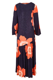 Product shot of the Ola Asymmetric Seam Dress in colour Boldflower (Blue), from the back