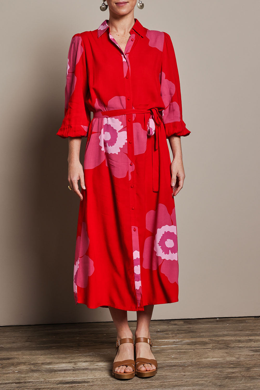 Model Katie wearing size 10 of the Leah Midi Shirt Dress in colour Boldred (Red), from the front, cropped image