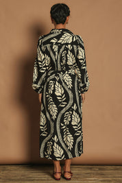 Model Katie wearing size 10 of the Leah Midi Shirt Dress in colour Blkvine (Black), from the back