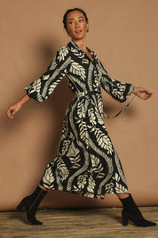Model Katie wearing size 10 of the Leah Midi Shirt Dress in colour Blkvine (Black), from the front, showing the whole outfit