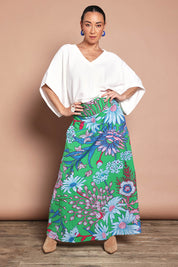 Model Katie wearing size 10 of the Rosemary Cotton Maxi Skirt in colour Greengard (Green), from the front, showing the whole outfit