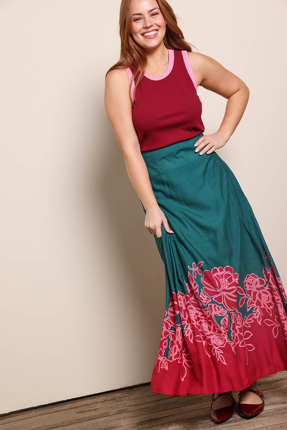 Model Georgiel wearing size 10 of the Rosemary Maxi Skirt – Rosepetal in colour Rosepetal, from the front