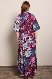 Model Georgiel wearing size 10 of the Katherine Cotton Tired Dress – Garden in colour Garden, from the front