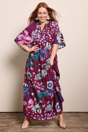 Model Georgiel wearing size 10 of the Katherine Cotton Tired Dress – Garden in colour Garden, from the front