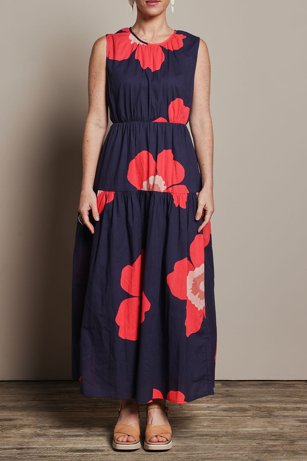 Model Katie wearing size 10 of the Riley Cotton Maxi Dress in colour Boldflower (Blue), from the front, cropped image