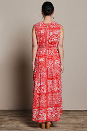 Model Katie wearing size 10 of the Riley Cotton Maxi Dress in colour Labyrinth (Red), from the back