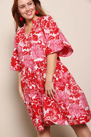 Model Georgiel wearing size 10 of the Kathy Cotton Dress – Bloomlet in colour Bloomlet, from an angle