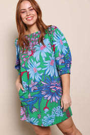 Model Georgiel wearing size 10 of the Polly Cotton Shift Dress – Greengard in colour Greengard, in a cropped view