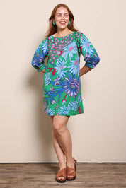 Model Georgiel wearing size 10 of the Polly Cotton Shift Dress – Greengard in colour Greengard, from the front
