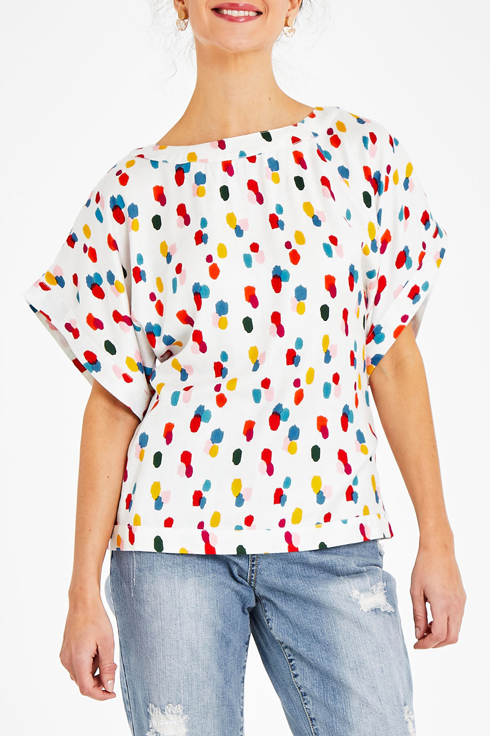 Model Courtney wearing size 10 of the Lola Belle Sleeve Top in colour Speckled (White), from the front, cropped image