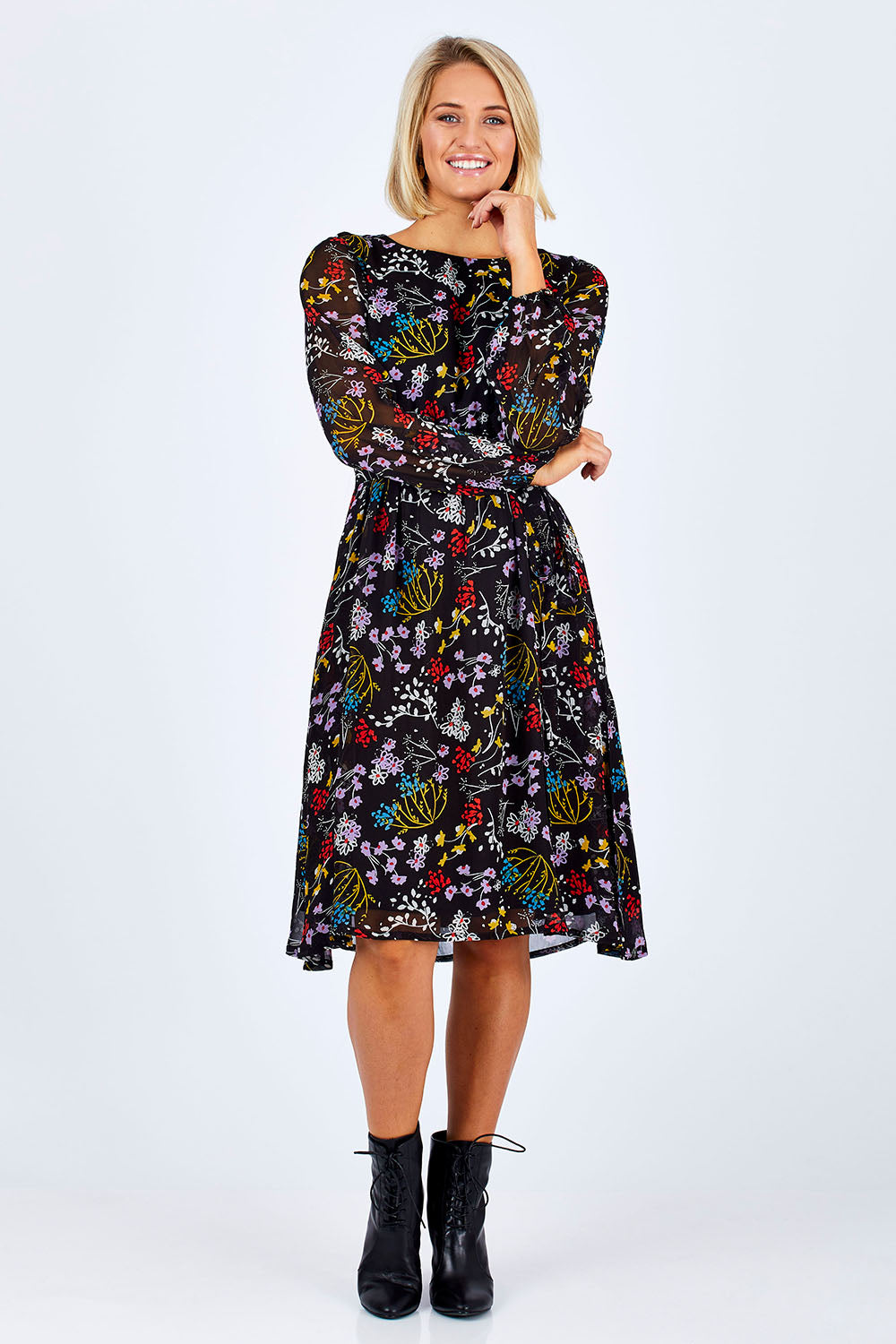 Model Emma wearing size 10 of the Odette Dress Garden Dweller in colour Black (Black), from the front, showing the whole outfit