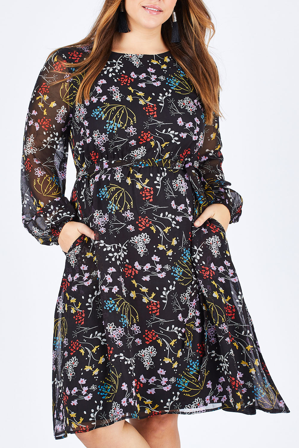 Model Sophie wearing size 14 of the Odette Dress Garden Dweller in colour Black (Black), from the front, cropped image
