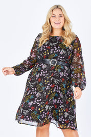 Model Sophie wearing size 18 of the Odette Dress Garden Dweller in colour Black (Black), from the front, cropped image