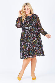 Model Sophie wearing size 18 of the Odette Dress Garden Dweller in colour Black (Black), from the front, showing the whole outfit