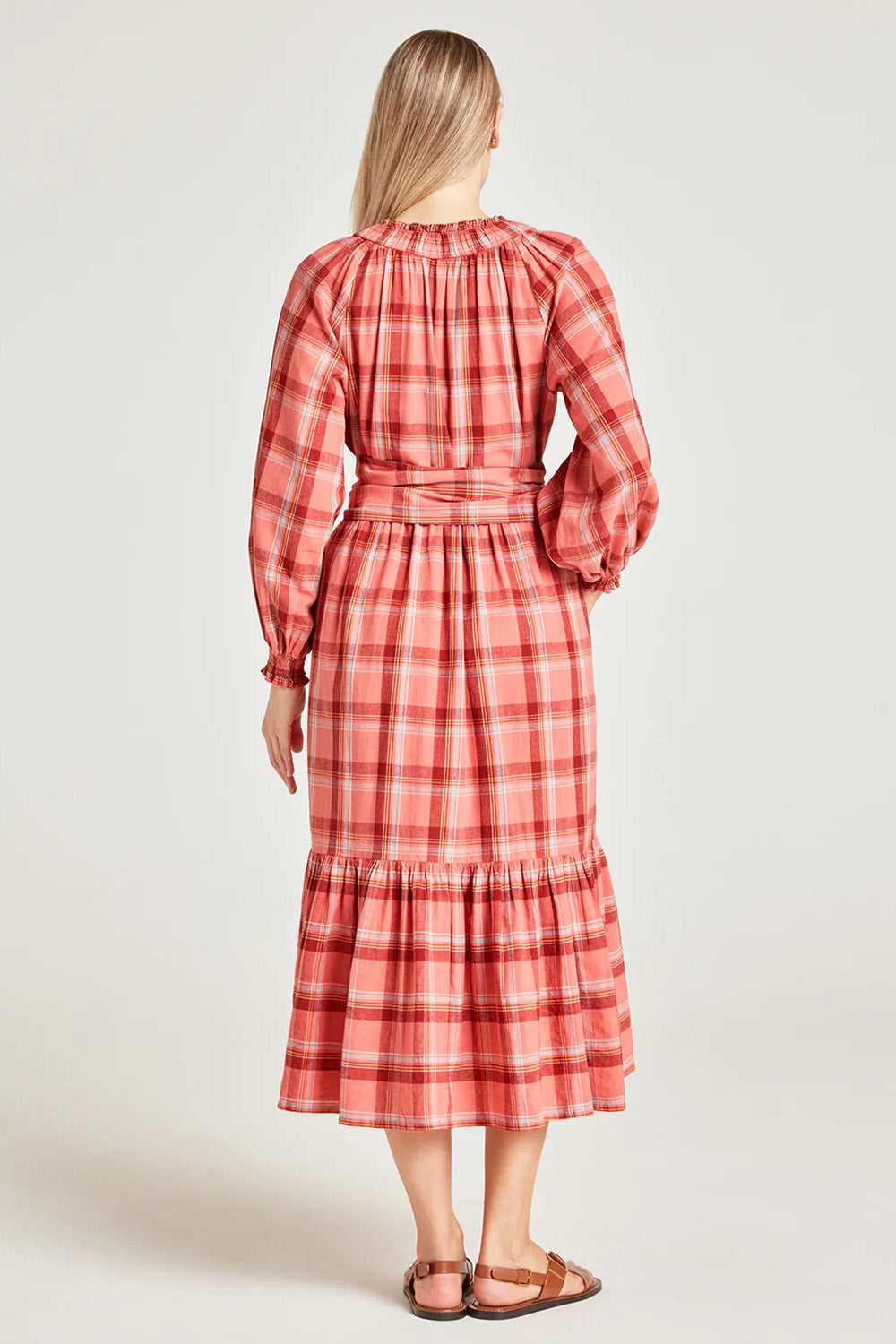 A model wearing the Iman Hemp Check Midi Dress in colour Lightcoral (Pink), from the back