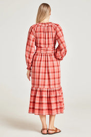 A model wearing the Iman Hemp Check Midi Dress in colour Lightcoral (Pink), from the back