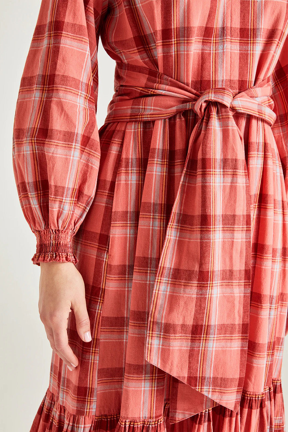 A model wearing the Iman Hemp Check Midi Dress in colour Lightcoral (Pink), from the front, cropped image