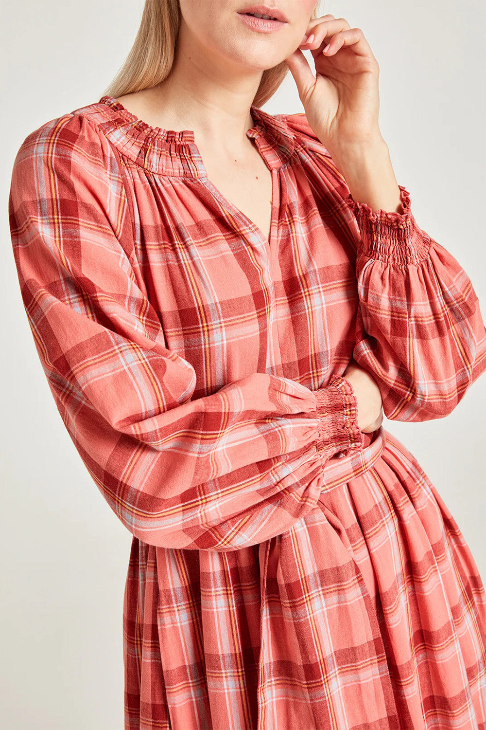A model wearing the Iman Hemp Check Midi Dress in colour Lightcoral (Pink), from the front, cropped image