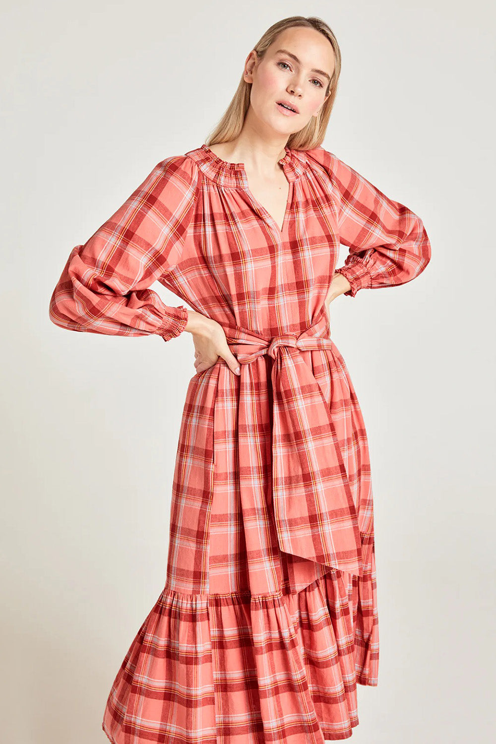 A model wearing the Iman Hemp Check Midi Dress in colour Lightcoral (Pink), from the front, cropped image