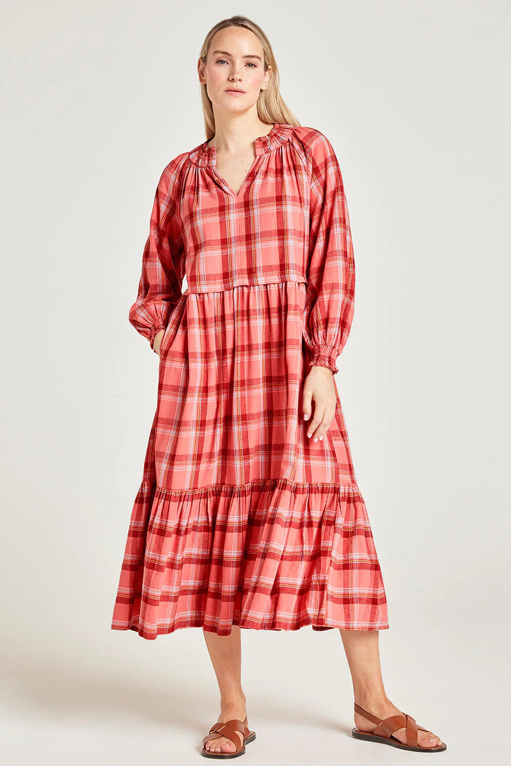 A model wearing the Iman Hemp Check Midi Dress in colour Lightcoral (Pink), from the front, showing the whole outfit