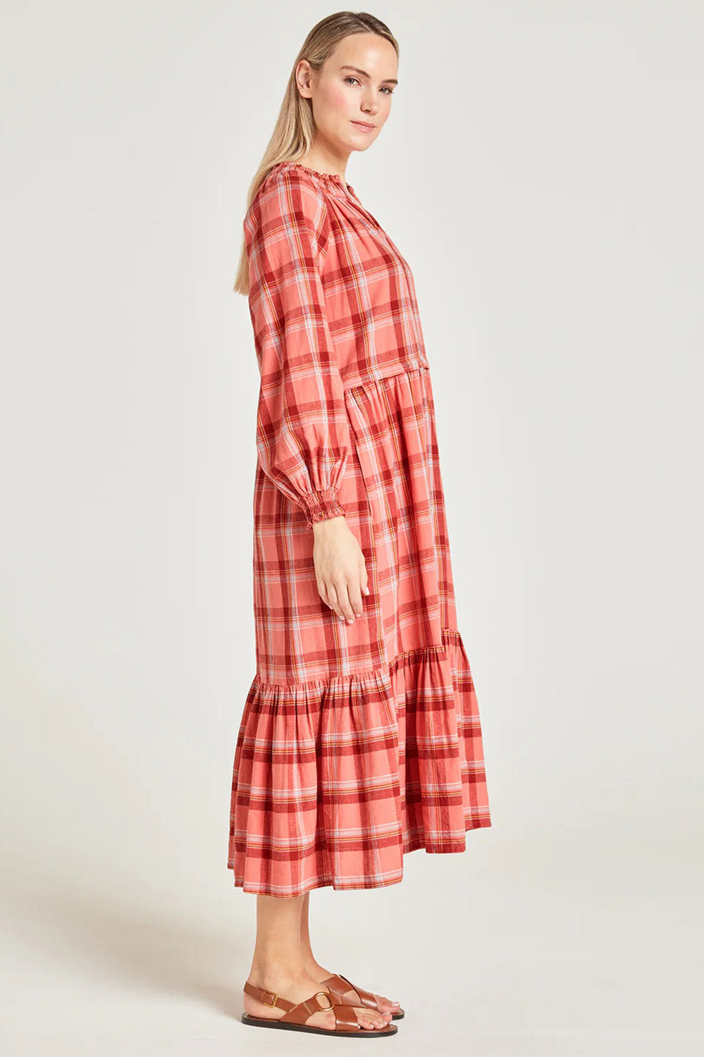 A model wearing the Iman Hemp Check Midi Dress in colour Lightcoral (Pink), from the front, showing the whole outfit
