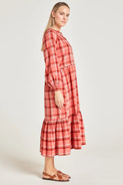 A model wearing the Iman Hemp Check Midi Dress in colour Lightcoral (Pink), from the front, showing the whole outfit