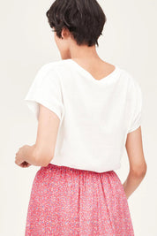 A model wearing The Easy Hemp Vin colourNeck Top - White (White), from the back
