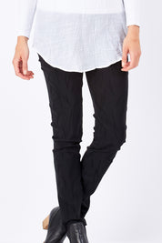 Model Rebecca wearing size S of the Sally Textured Pant in colour Black (Black), from the front, cropped image