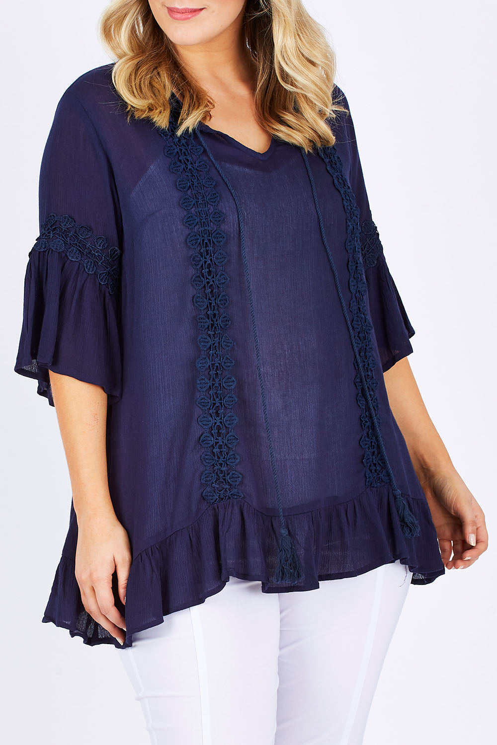 Model Jess wearing size L of the Lace Trim Kaftan in colour Navy (Blue), from the front, cropped image