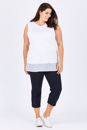 Model Mae wearing size XXL of the Eyelet Trim Pant in colour Navy (Blue), from the front, showing the whole outfit