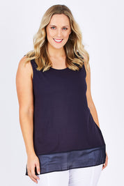 Model Jess wearing size L of the Reversible Scoop/v Neck Tank in colour Navy (Blue), from the front, cropped image