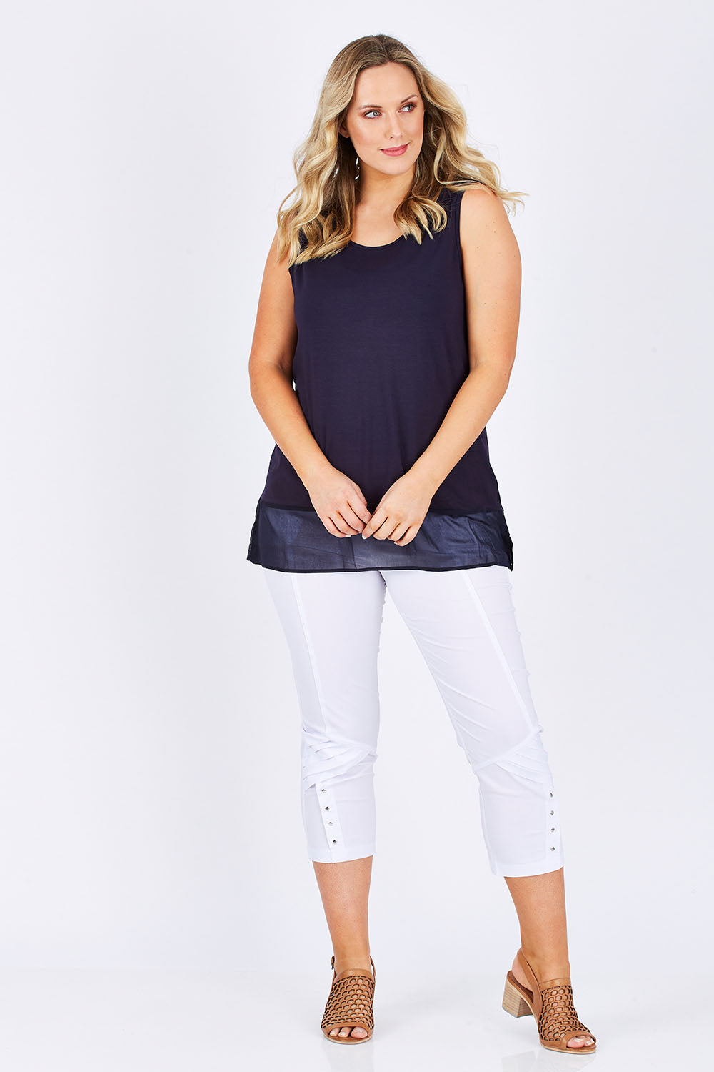 Model Jess wearing size L of the Reversible Scoop/v Neck Tank in colour Navy (Blue), from the front, showing the whole outfit