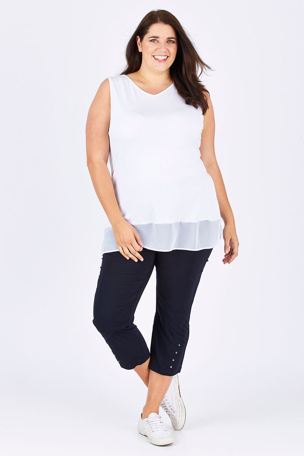 Model Mae wearing size XXL of the Reversible Scoop/v Neck Tank in colour White (White), from the front, showing the whole outfit