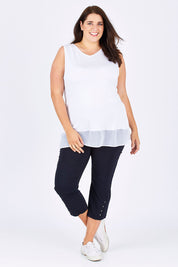 Model Mae wearing size XXL of the Reversible Scoop/v Neck Tank in colour White (White), from the front, showing the whole outfit